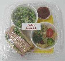 Turkey with Cranberry Salsa, Broccoli Peanut Raisin Salad, Italian Pasta Salad, Chess Bar